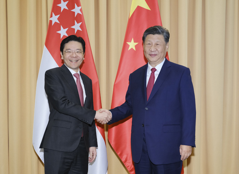 當地時間11月15日上午,國家主席習近平在利馬出席亞太經合組織領導人非正式會議期間會見新加坡總理黃循財。